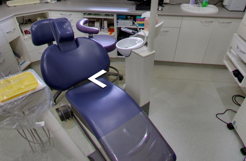 Treatment room with dental chair and clinical cabinetry