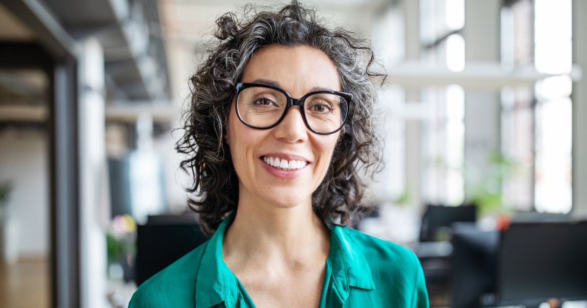 Woman smiling confidently at the camera