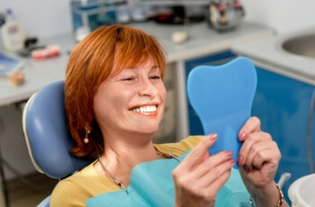 Woman smiling after a dental check-up