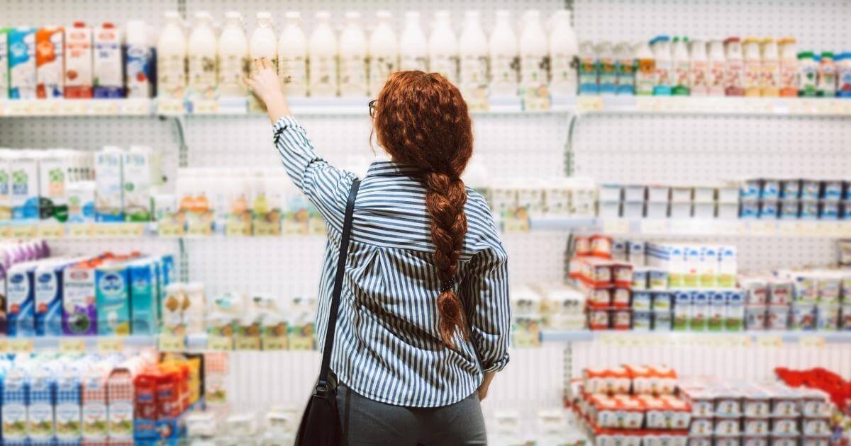 Woman shopping for fresh food in a supermarket