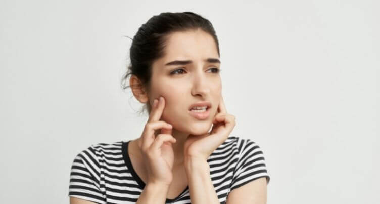 Person waking with jaw discomfort