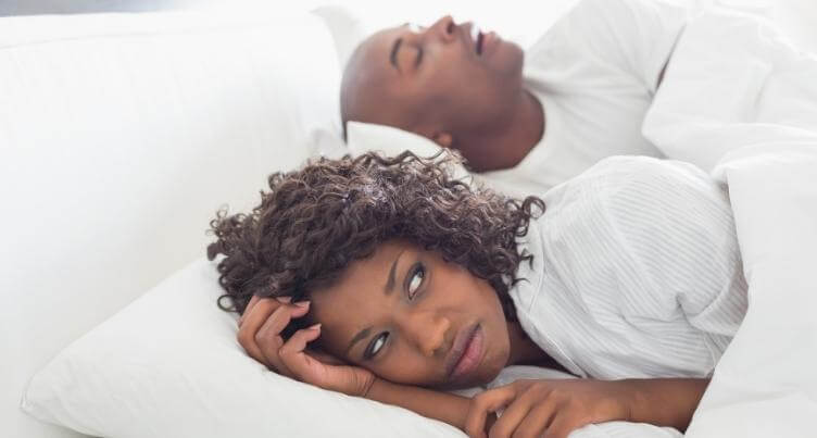 Person sleeping restlessly