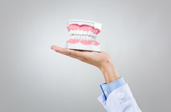 Dentist explaining a treatment to a patient