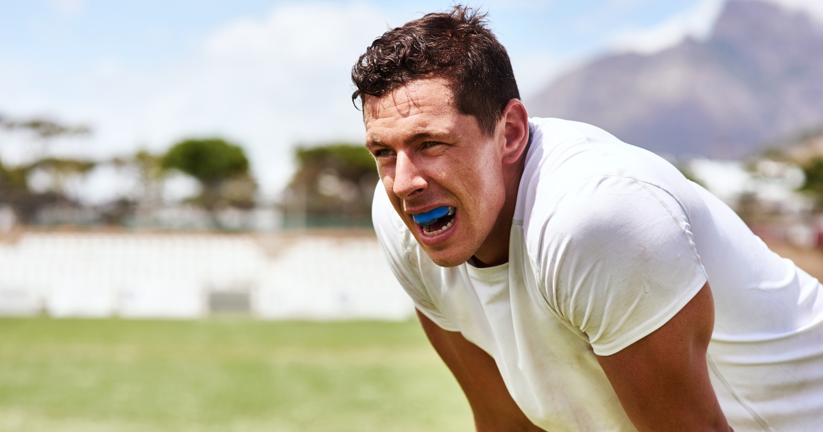 Athlete wearing a sports mouthguard