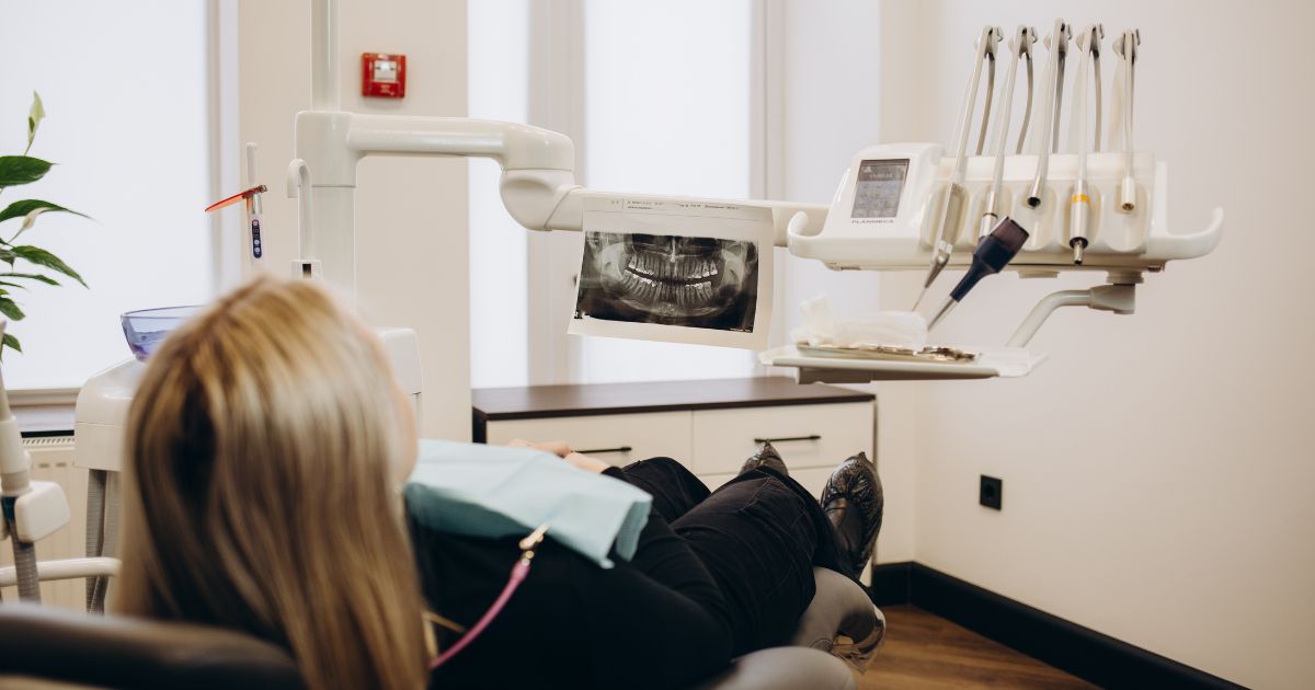Patient sitting comfortably and relaxed in a dental chair