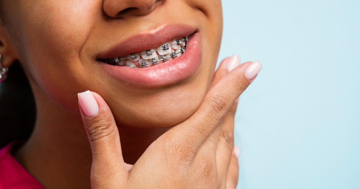 Woman with braces smiling